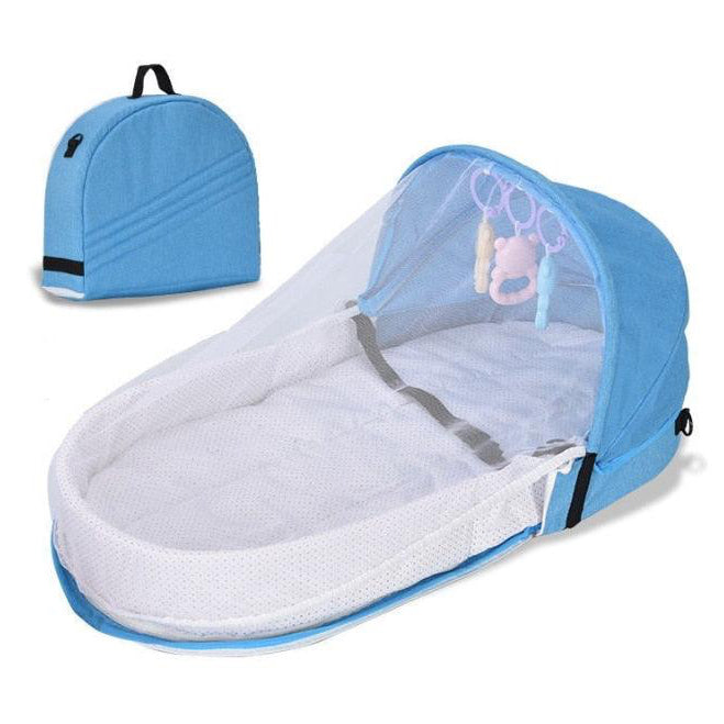 Portable baby mosquito net tent bed, foldable travel crib for infant protection.
