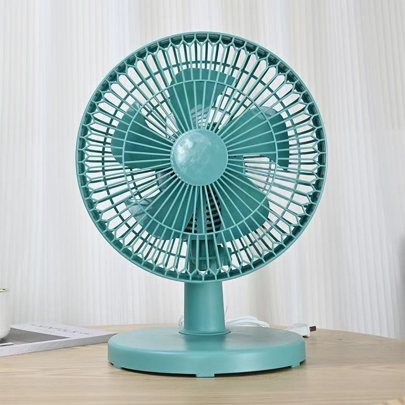 Quiet personal fan providing refreshing air circulation, a summer essential.