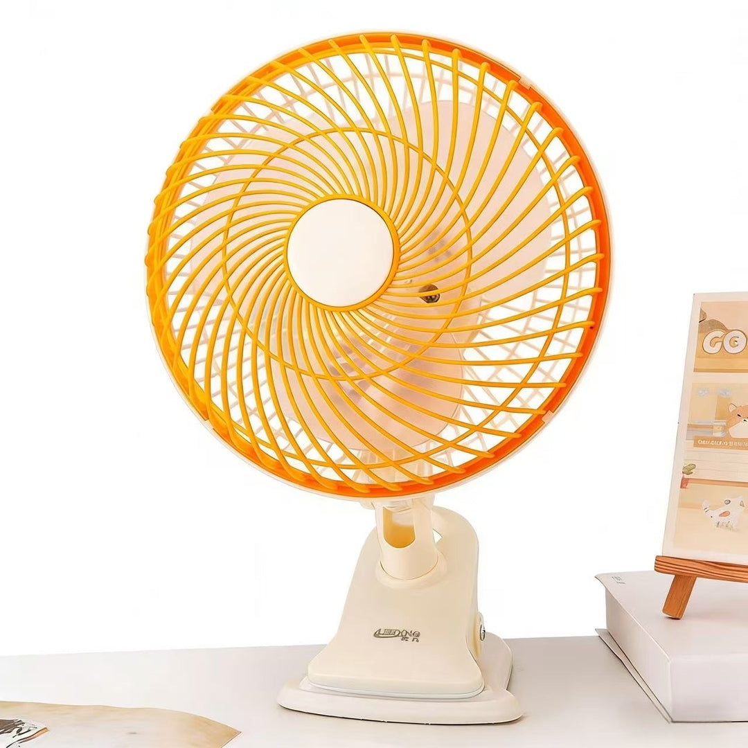 Small portable fan for office, delivering quiet, personal air flow.