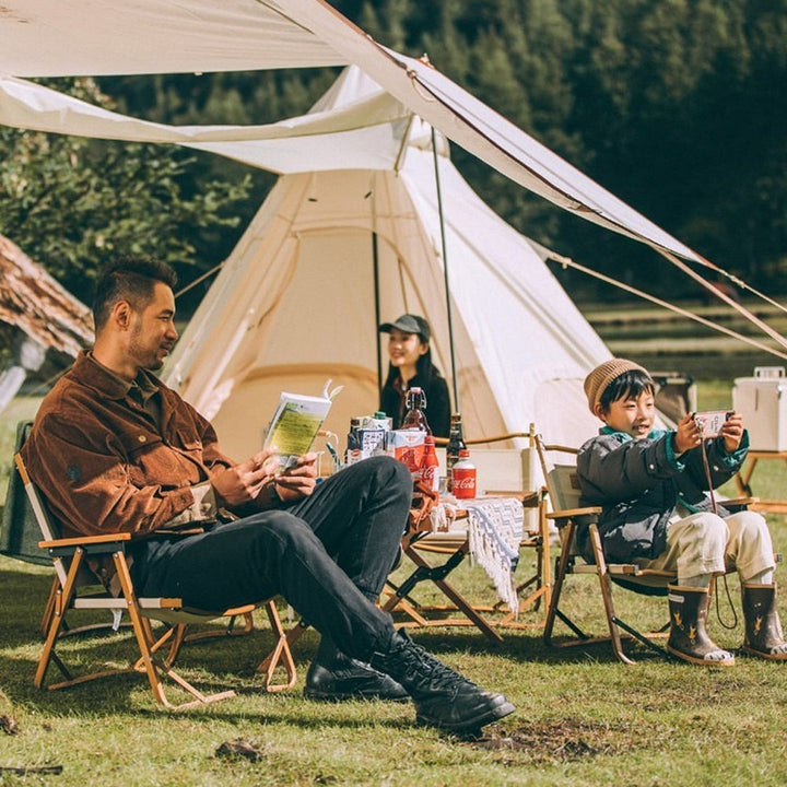 Unisex folding camping chair, compact & comfortable for outdoor adventures.