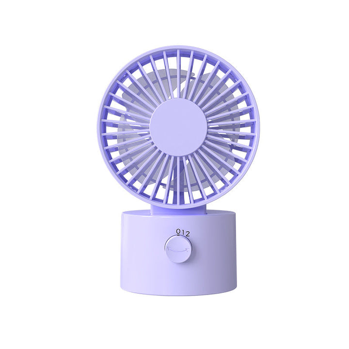 Portable mini air circulator fan for desk or home office. Features quiet operation & adjustable speed settings for personal comfort.