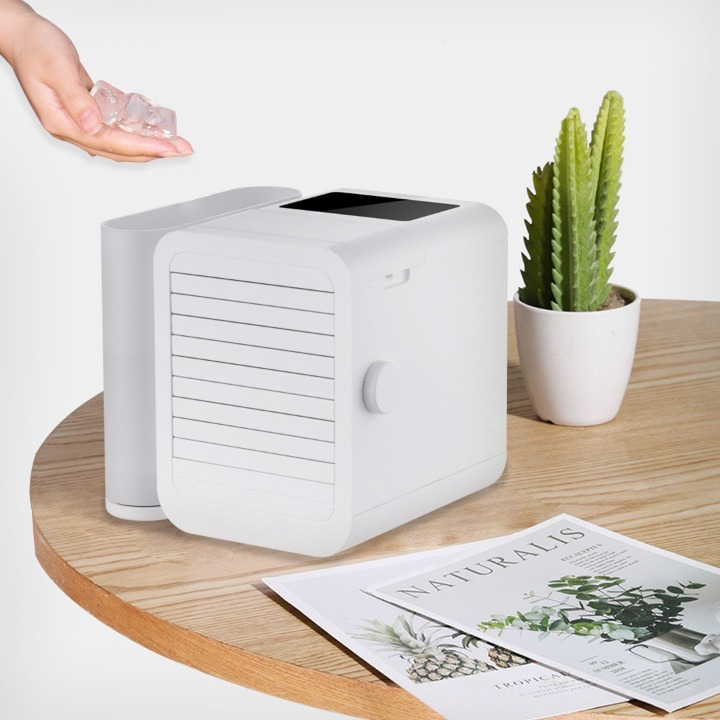 Portable mini air conditioner, personal evaporative cooler with large water tank for desk cooling.