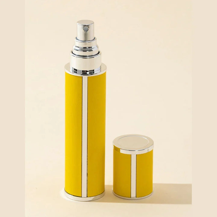Portable perfume travel spray bottle, 0.34 fl oz. Refillable & leak-proof atomizer for fragrance on-the-go.