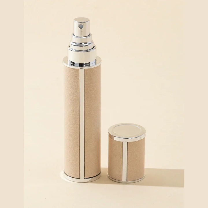 Unisex portable perfume travel spray bottle, 0.34 fl oz. Refillable and leak-proof atomizer for any fragrance.