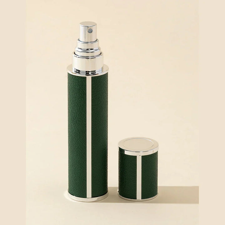 Easily refillable 0.34 fl oz portable perfume travel spray bottle. Leak-proof atomizer for quick fragrance access.