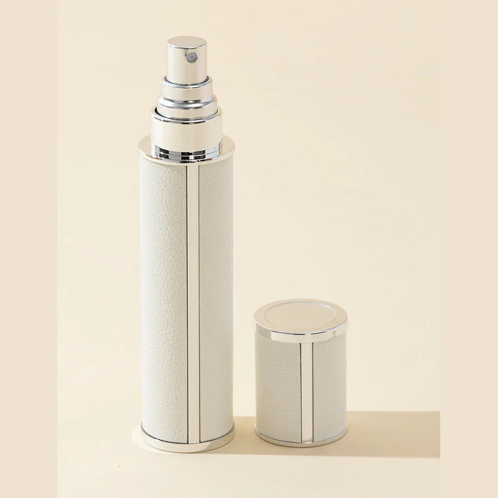 Essential beauty accessory: leak-proof 0.34 fl oz refillable perfume travel spray bottle for portable fragrance.