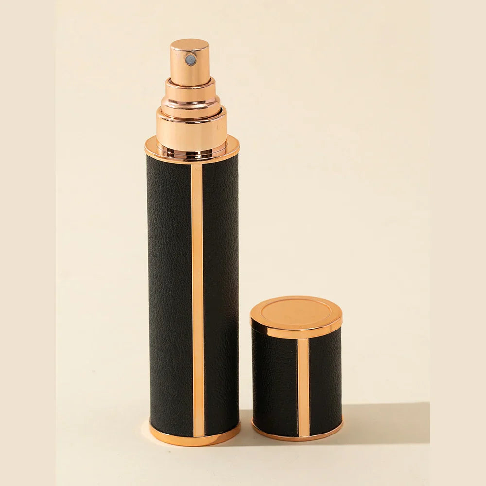 Compact 0.34 fl oz mini perfume atomizer, portable & refillable for travel fragrance. Leak-proof design.