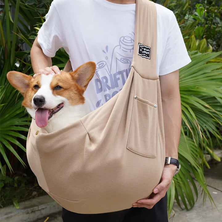 Stylish portable pet carrier bag for easy dog & cat travel. Lightweight oxford fabric ensures pet comfort.