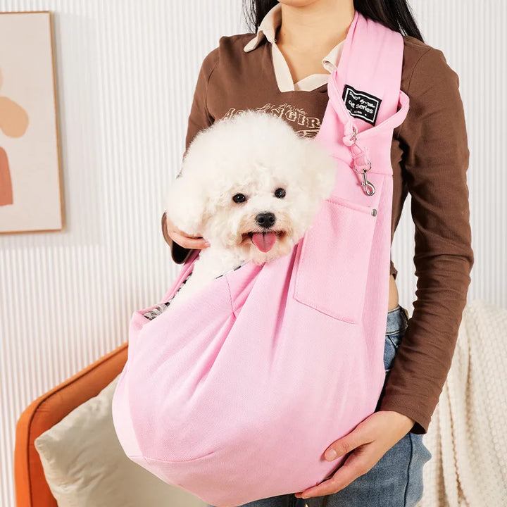 Breathable cat travel bag & small dog carrier. Portable design made from sturdy oxford fabric for pet comfort.