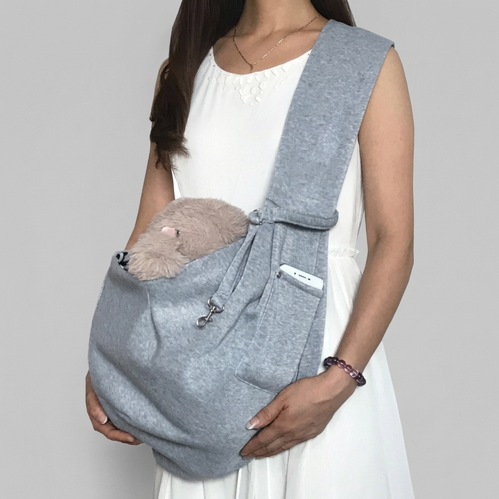 Portable pet travel bag ensures safe & comfortable journeys for small pets. Durable oxford fabric pet accessory.