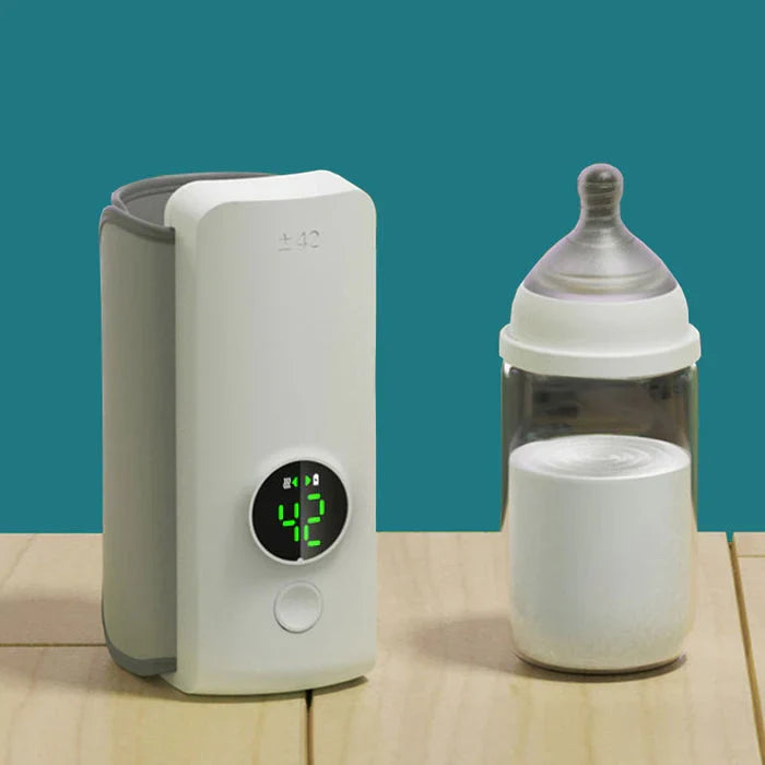 Portable rechargeable baby bottle warmer with digital display, perfect for on-the-go feeding and travel.
