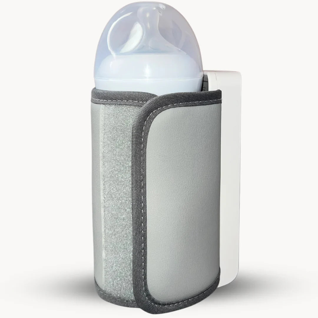 Compact rechargeable baby bottle warmer, keeps milk warm for easy feeding. BPA-free, digital display.