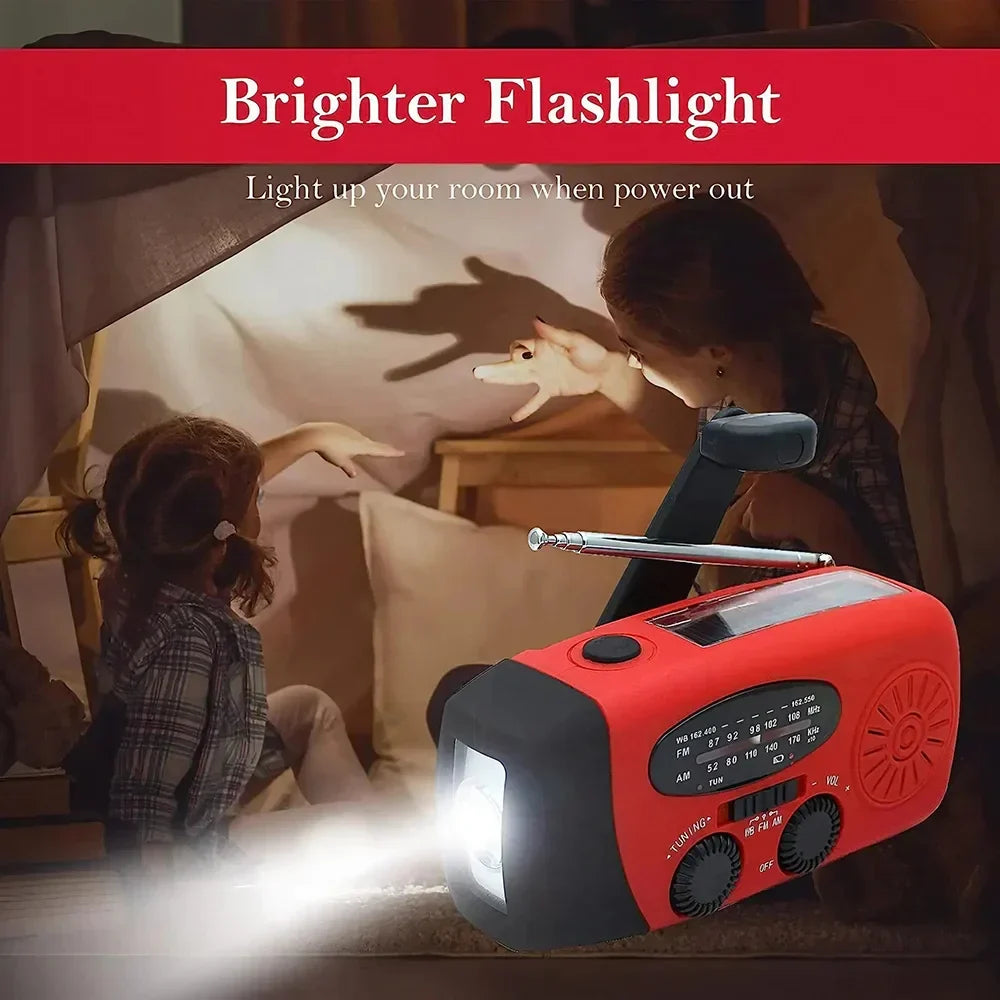 Survival gadget: hand crank solar radio with LED flashlight, phone charger, weather alert for emergencies.