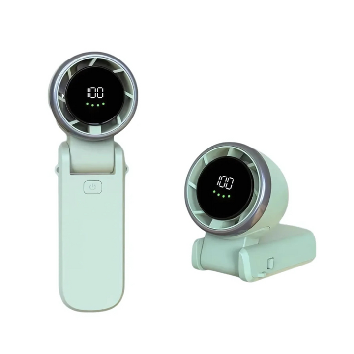 Person enjoying refreshing personal cooling from a silent, USB rechargeable mini turbo handheld fan outdoors.