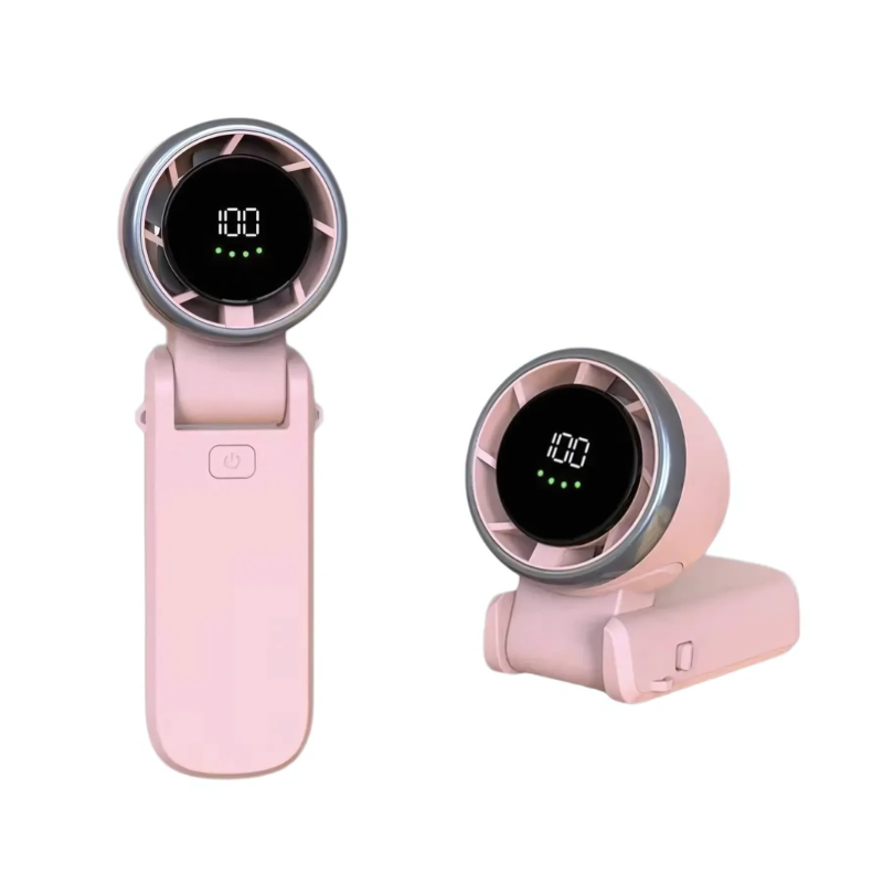 Hand holding a lightweight portable turbo fan, a must-have travel gadget for instant personal summer cooling.