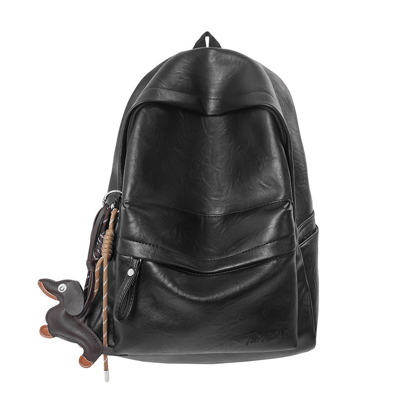 Unisex black leather backpack showing adjustable padded shoulder straps and a comfortable back panel for daily use.