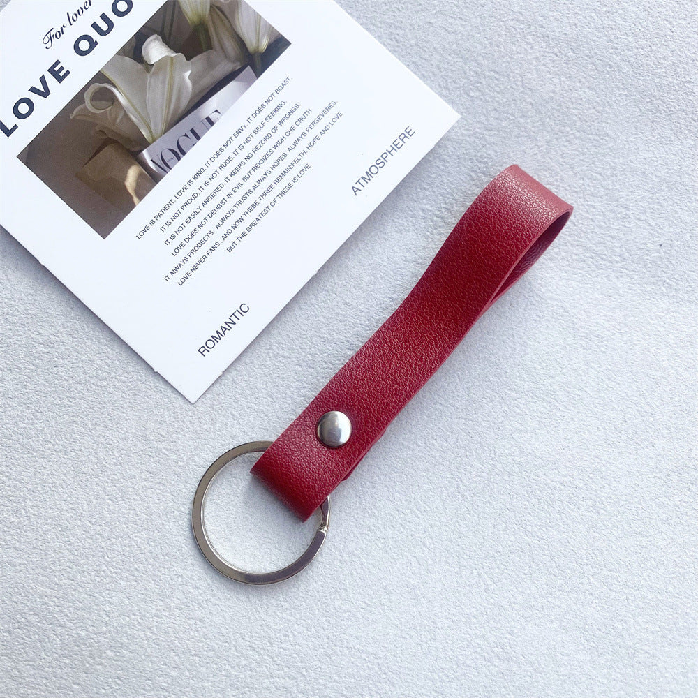 Premium red leather key holder, an elegant & robust accessory.
