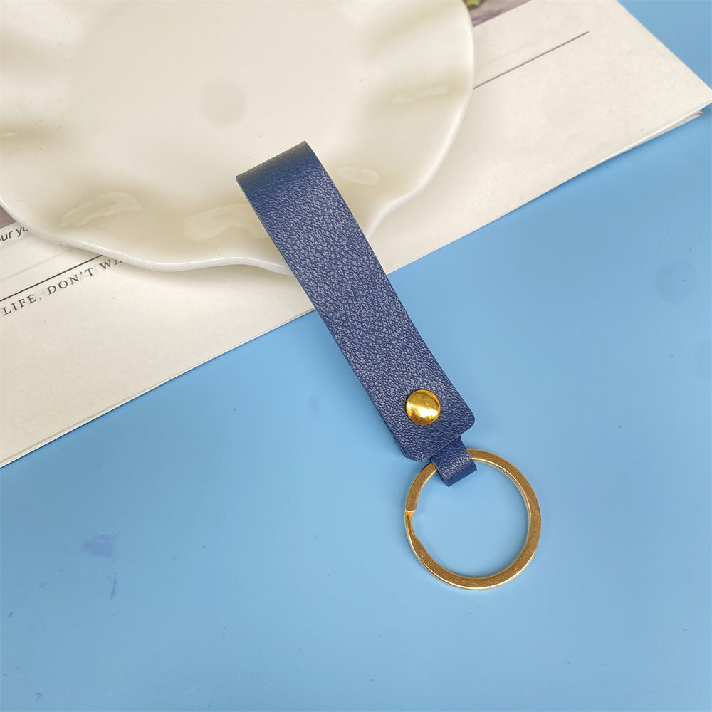 Red leather keychain, a chic and durable key accessory for all.