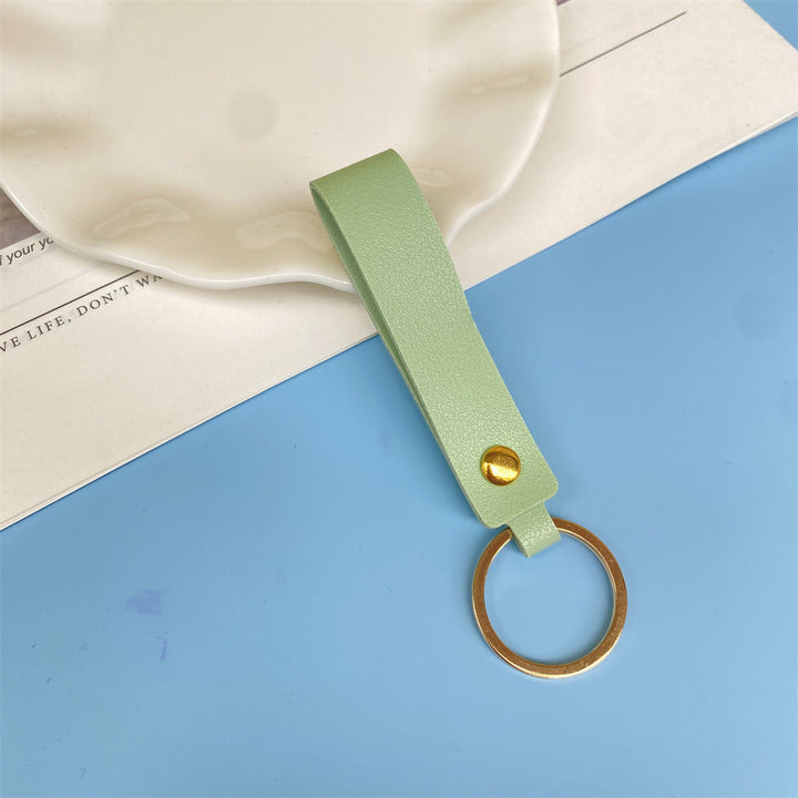 Blue premium leather key holder, modern & robust for keys.