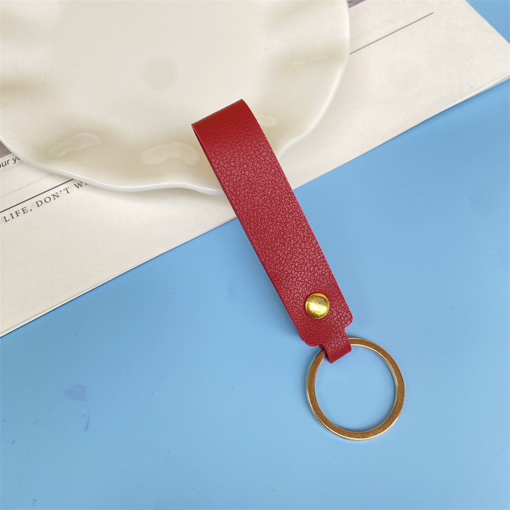 Pink leather keychain, a compact & elegant key organizer.