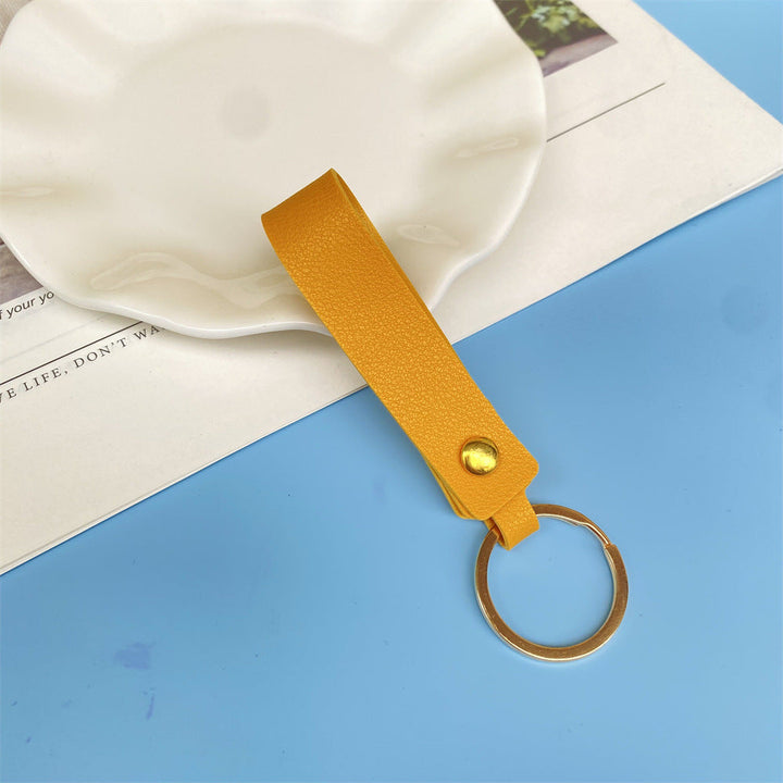 Unisex premium leather key fob, organize keys with style & durability.