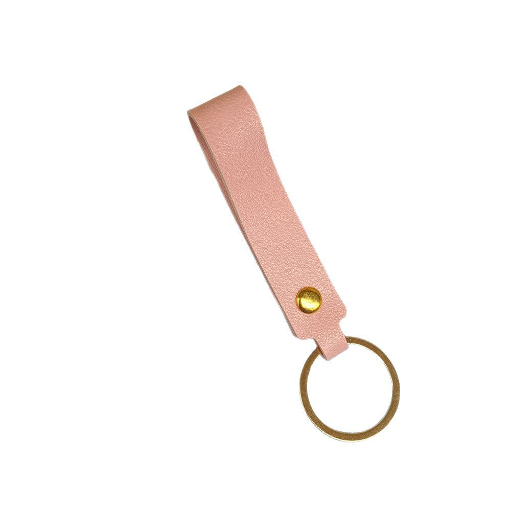 Green premium leather key holder, a stylish gift idea.