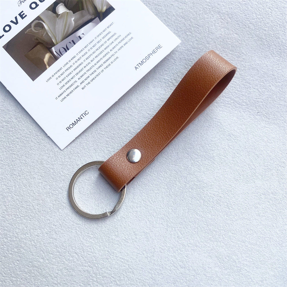 Unisex black leather key fob, organized keys with premium style.