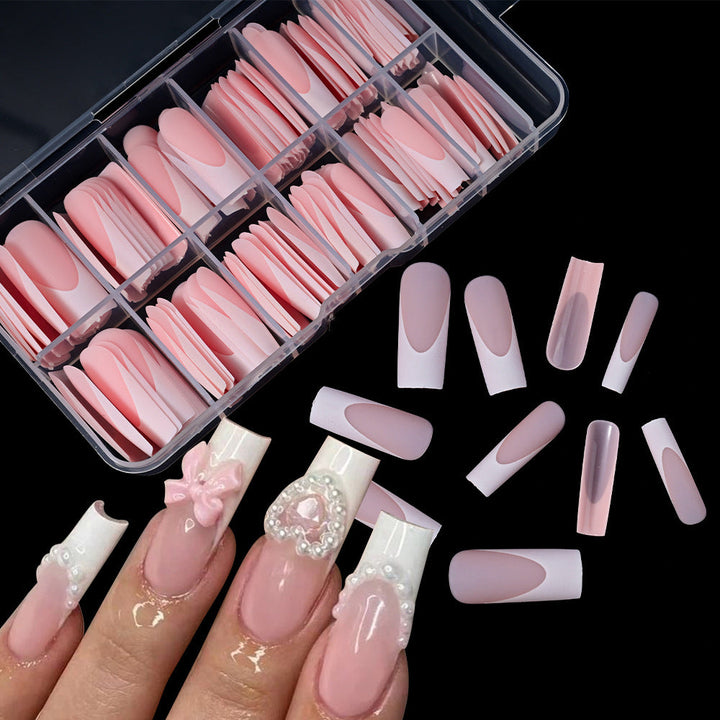 Elegant French tip fake nails for an instant, salon-quality manicure; ideal for women's beauty.