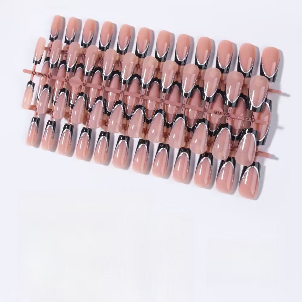 Elegant nude glossy press-on nails, perfect for a sophisticated women's artificial nail manicure.