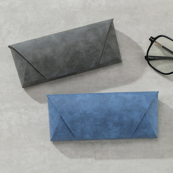 Elegant leather accessory pouch for sunglasses, stylish protection for men & women.