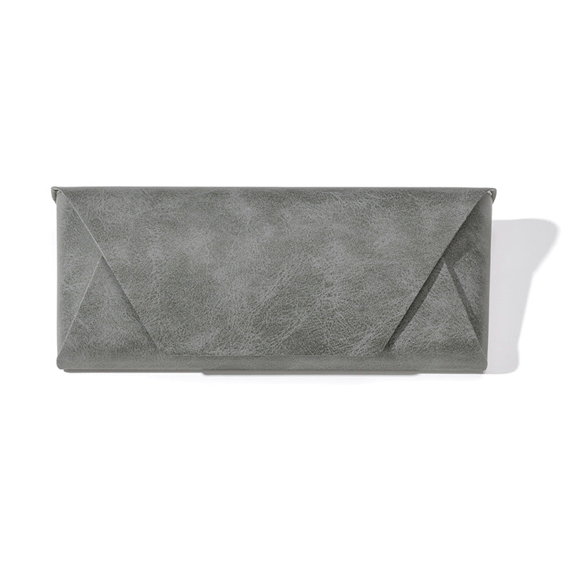 Sleek black premium leather eyewear pouch, ideal for stylish travel & glasses protection.