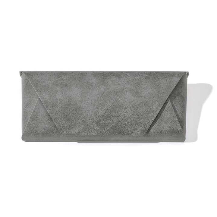 Sleek black premium leather eyewear pouch, ideal for stylish travel & glasses protection.
