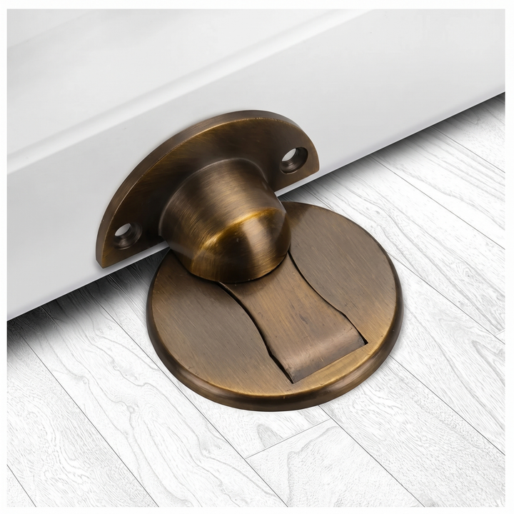 Magnetic door catch for secure doors. Easy wall mount installation, perfect for home improvement projects.