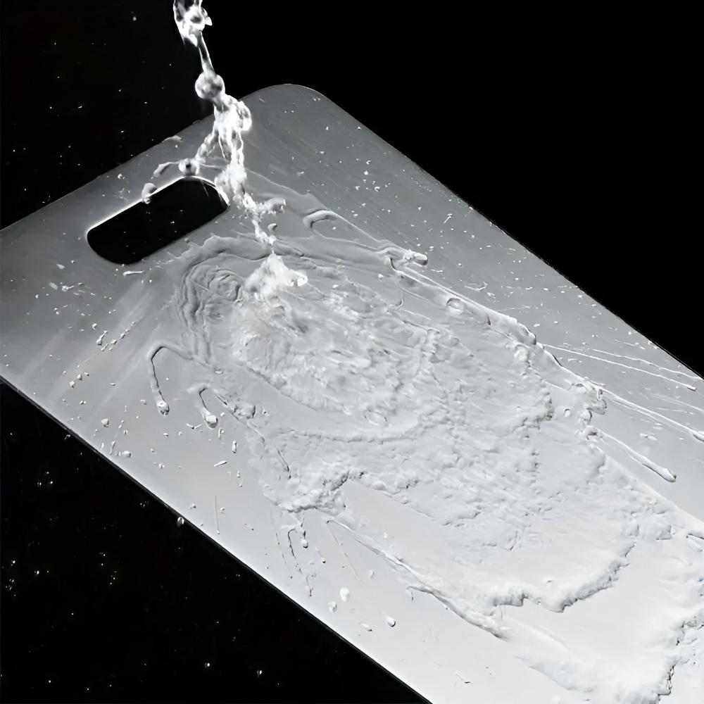 Durable stainless steel cutting board, essential kitchen cookware for hygienic and efficient food prep.