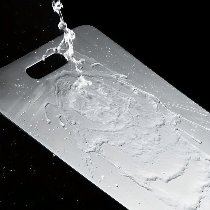 Durable stainless steel cutting board, essential kitchen cookware for hygienic and efficient food prep.