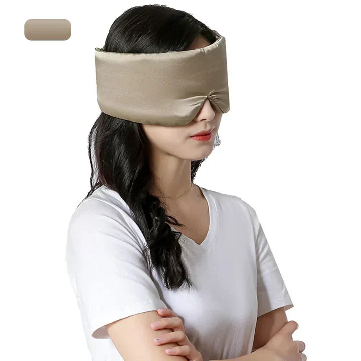 Travel-friendly mulberry silk sleep mask, essential for restful journeys & relaxation.