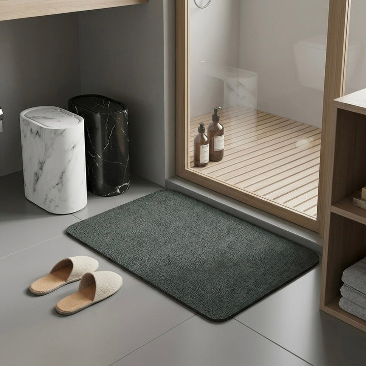 Detailed view of the non-slip backing on a quick-dry bath mat, ensuring bathroom safety and stability.