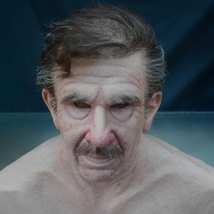 High-detail old man latex mask for realistic Halloween or theatre roles.