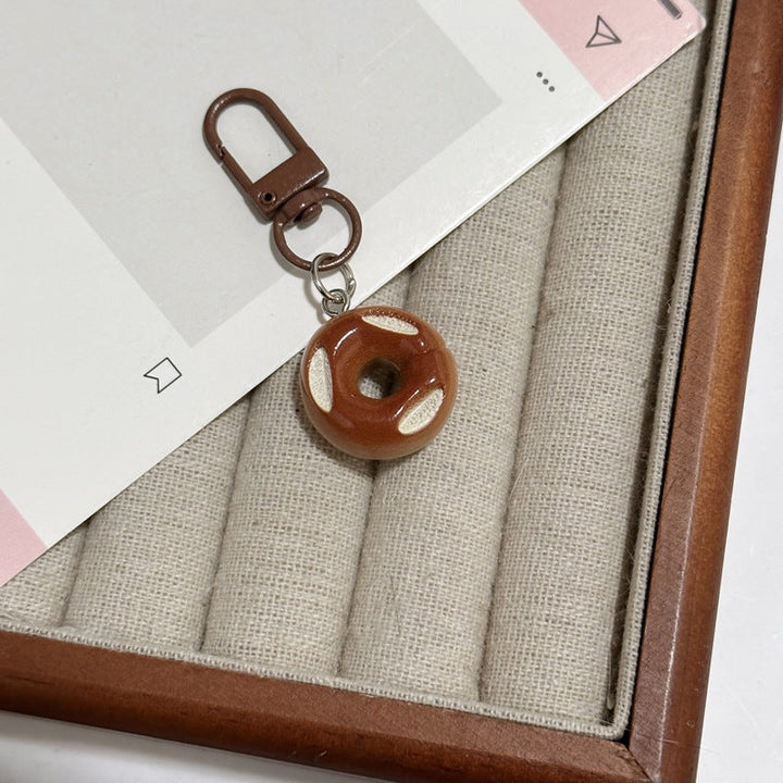 Novelty bread keychain, a cute and unique food-themed accessory for everyday use.