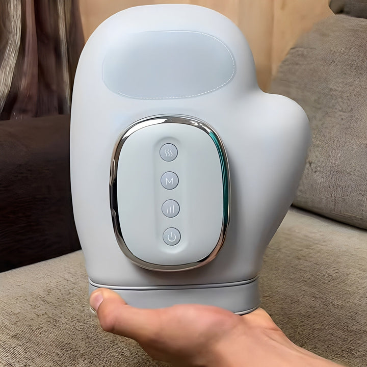 Ergonomic rechargeable hand massager provides hand therapy with soothing heat and air compression.