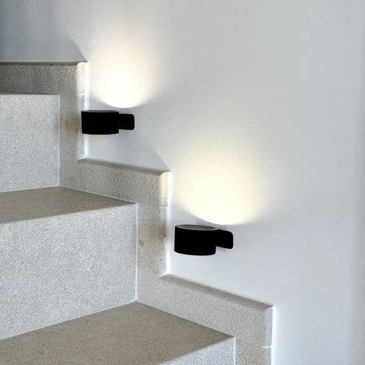 Wireless wall light for bedroom, rechargeable LED, adjustable for reading or ambient glow.