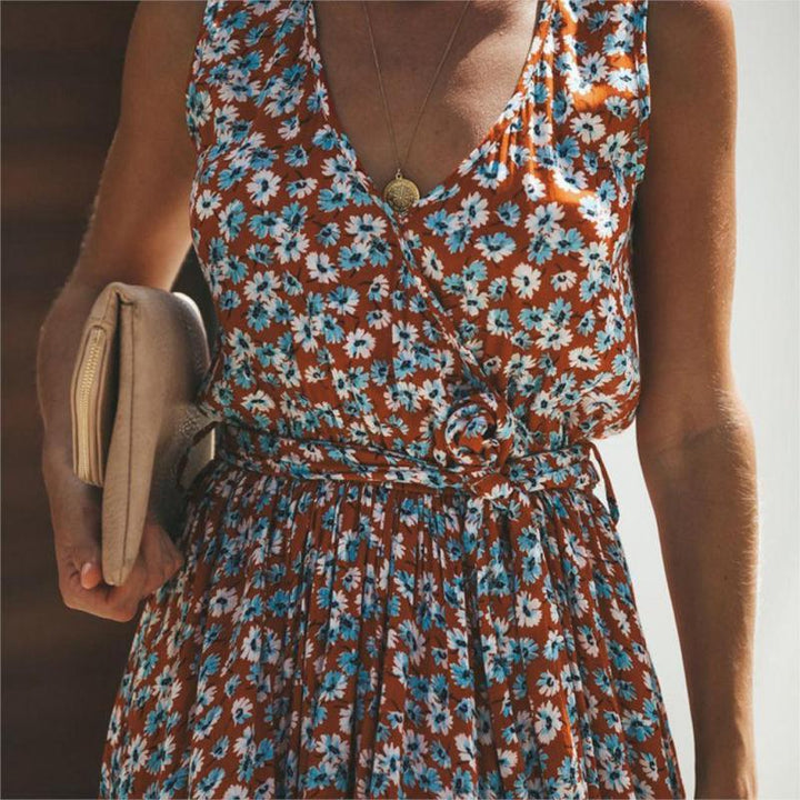 Women's Ibiza floral V-neck sleeveless maxi dress in red, a comfortable and stylish tiered summer holiday dress.