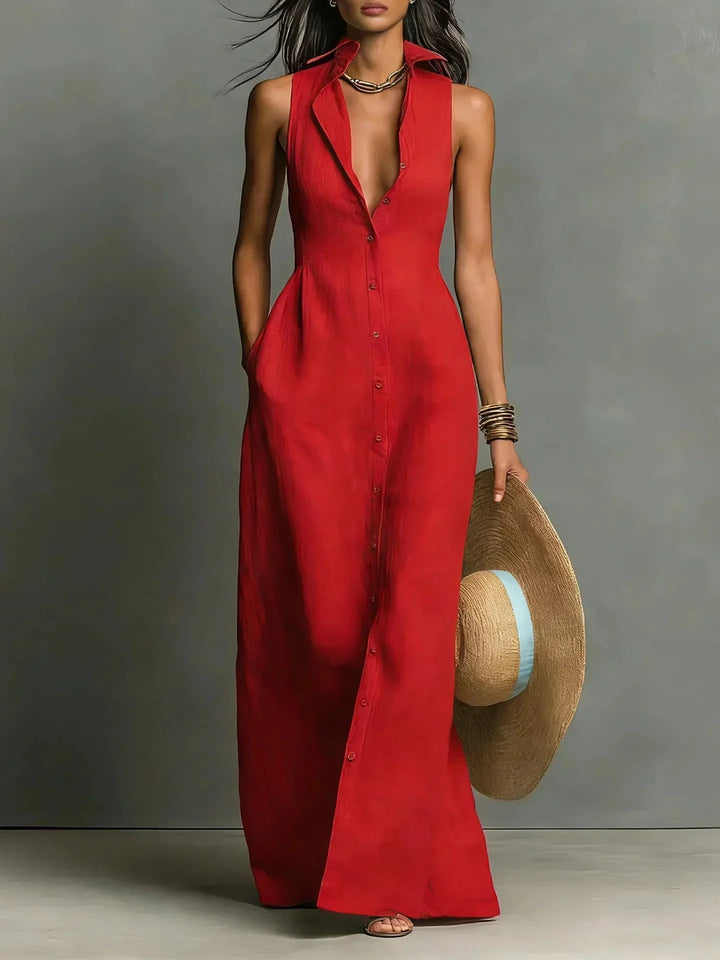 Red sleeveless button-down maxi dress for women, featuring a collared V-neck and practical pockets.