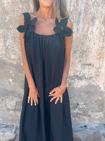 Stylish green flowing maxi dress for women, featuring a U-neck and elegant bow straps.