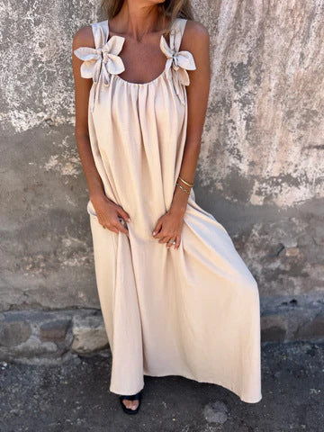 Black Women's Maxi Dress with U-neck and bow straps, ideal for elegant summer events.