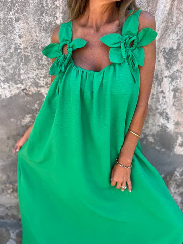 Vacation-ready elegant U-neck maxi dress for women, featuring stylish bow straps.