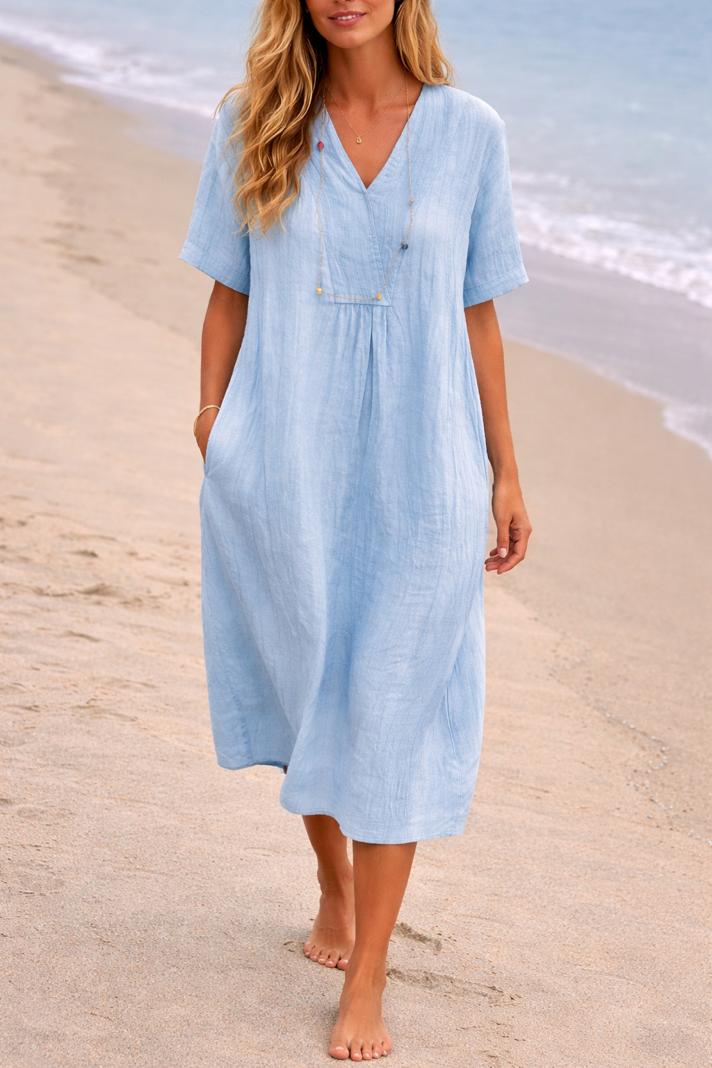 Comfortable women's midi dress with V-neck, ideal for versatile everyday fashion. A flowy, casual summer essential.