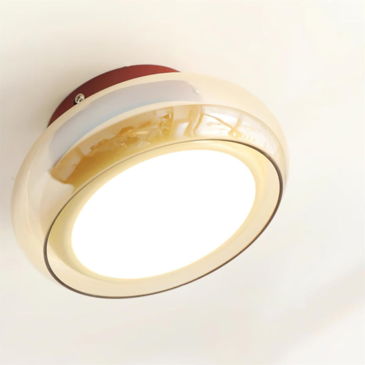 Compact retro flush mount LED ceiling light, designed for seamless indoor ceiling installation.