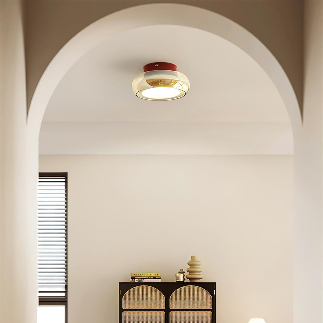 Modern vintage flush mount LED ceiling light, a sleek indoor lighting solution for dining rooms.