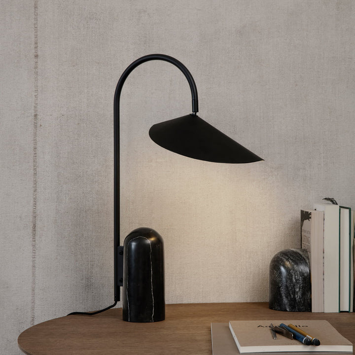 Reyaris modern arch desk lamp, provides ample light for focused tasks.